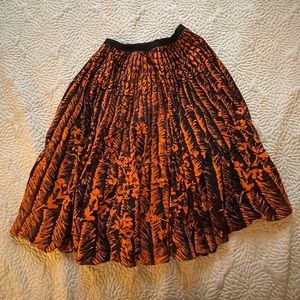Vintage pleated circle skirt - bright orange & black print